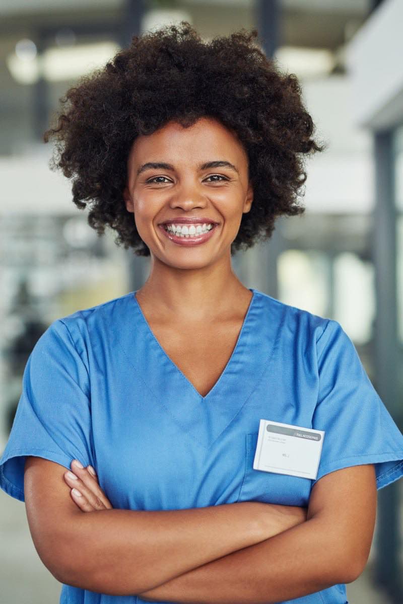 Female nurse in hospital smiling