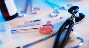 Stethoscope and instruments on table