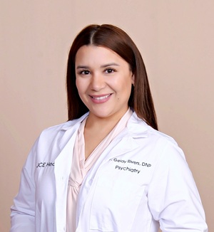 Geidty Rivers headshot in her medical white coat