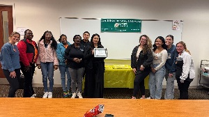 Group of students receiving reward
