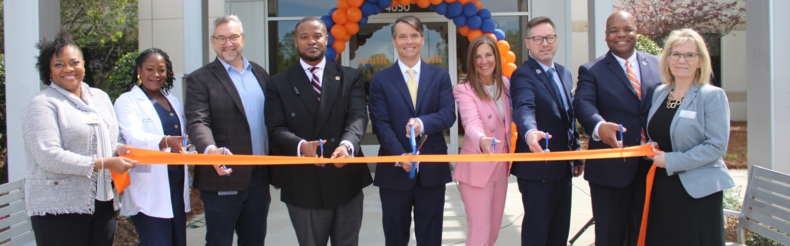 South University High Point ribbon cutting with the South University team