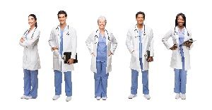 diverse group of nursing professionals standing together in their white coats