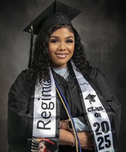 Regimia Williams in a graduation cap and cown