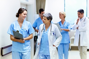 medical professionals gather together to discuss their plans