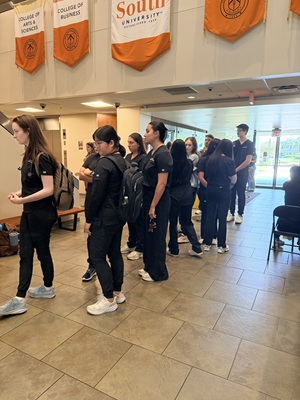 PA and Nursing students arrive at the Tampa campus to assist with an immunization event