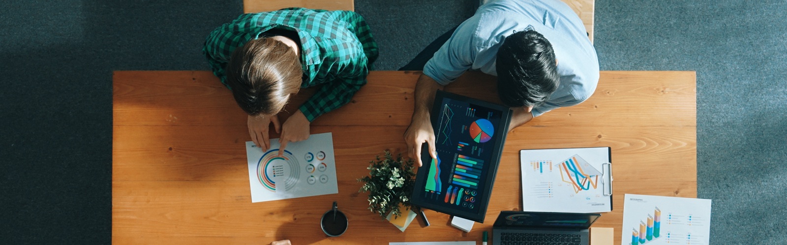 People working on a business project at a table