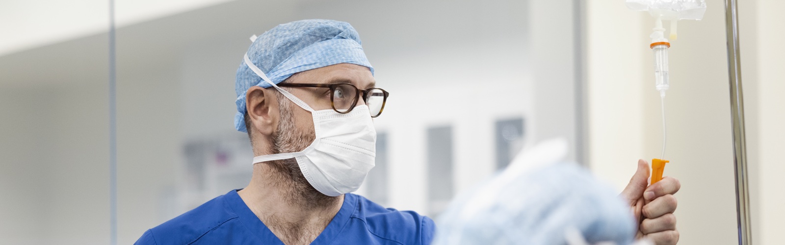 A healthcare worker works to ensure that a patient is getting the treatment they need