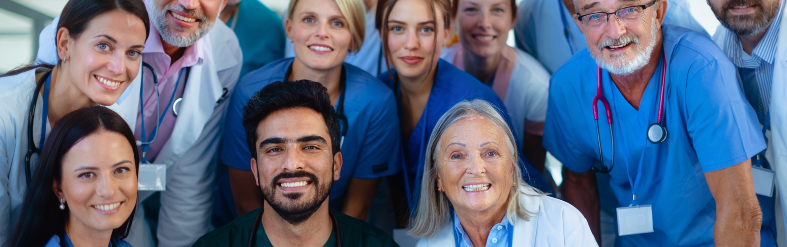 group of healthcare workers posing together for a photo