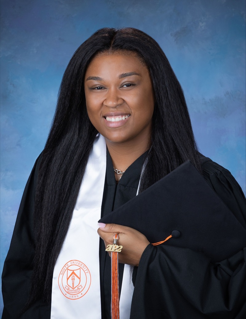 Candace Knowles in her graduation gown from South University