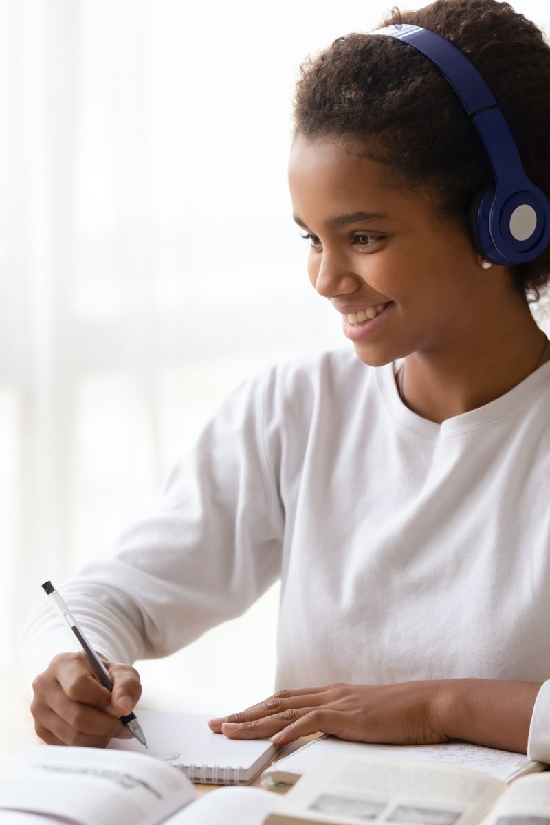 Female student studying on laptop