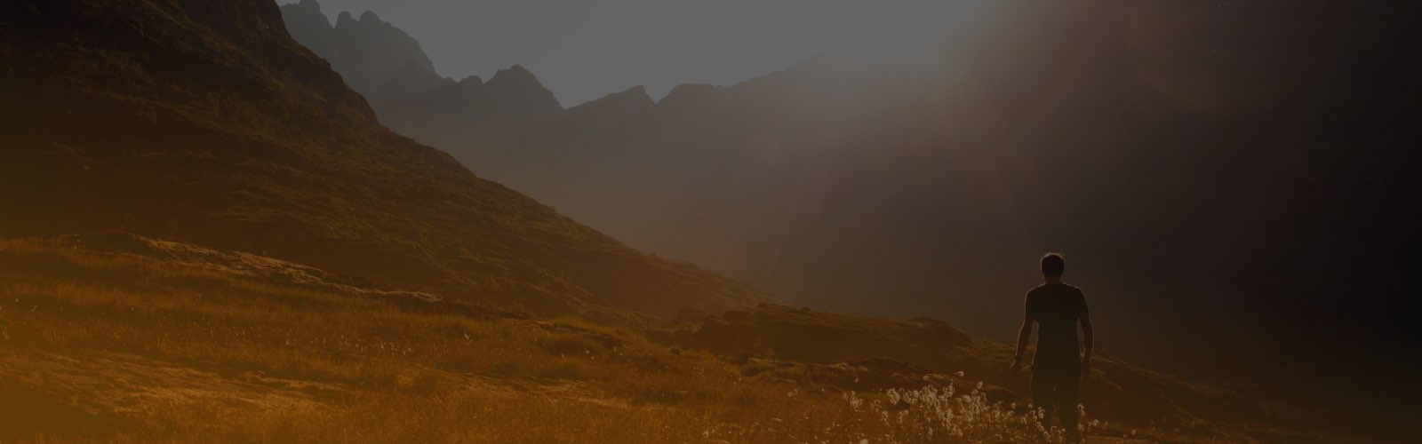 Person hiking in mountains