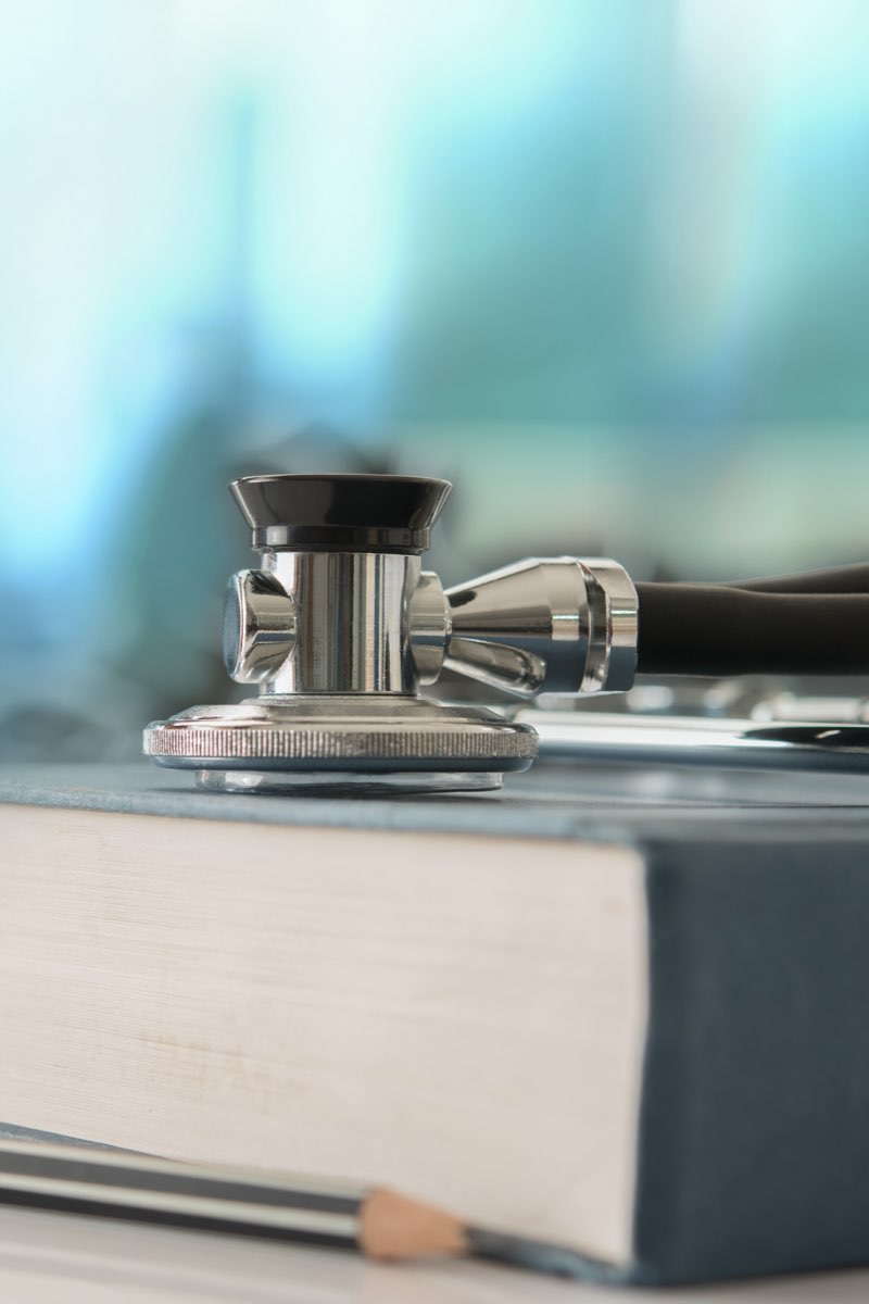 Stethoscope on medical book