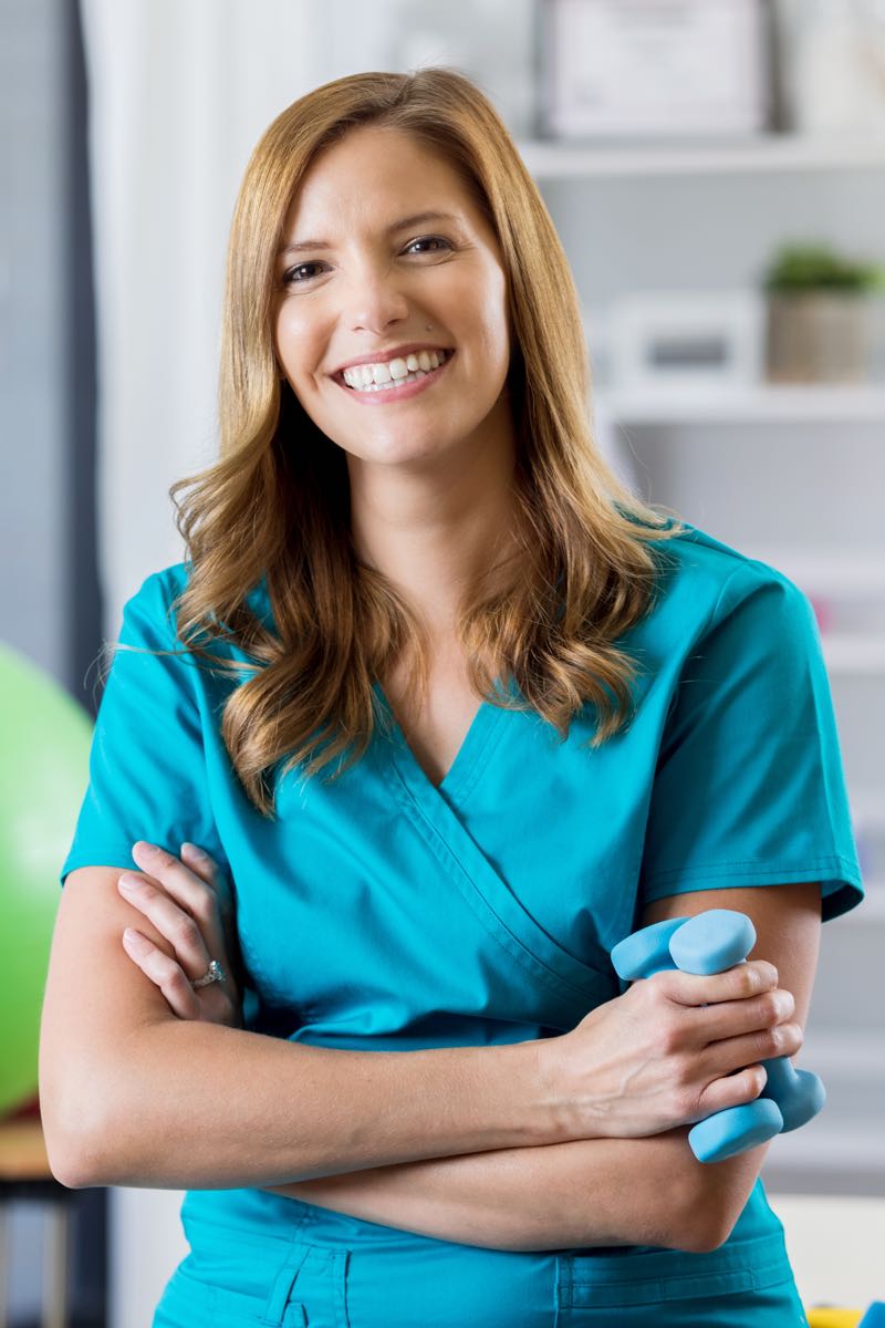 Female physical therapist assistant smiling