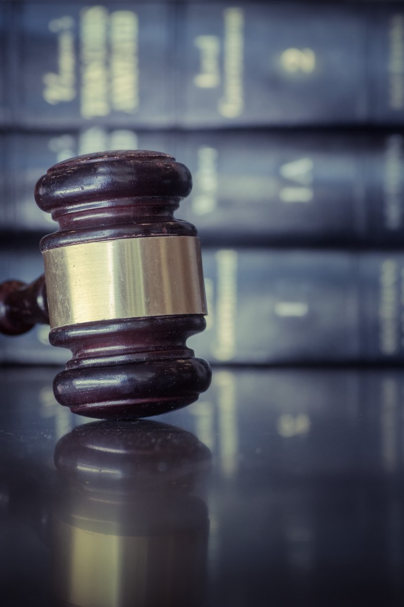Gavel with legal books
