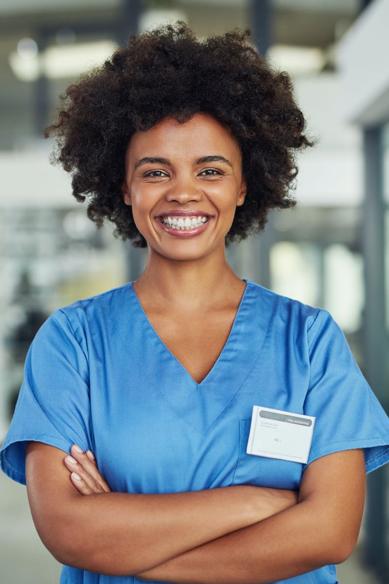 Femal nurse in hospital smiling