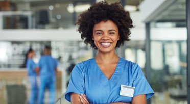 Female nurse smiling in hospital