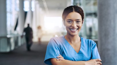 Nurse in hospital hallway-alt-text