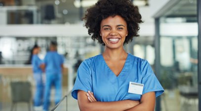 Female nurse in hospital smiling-alt-text