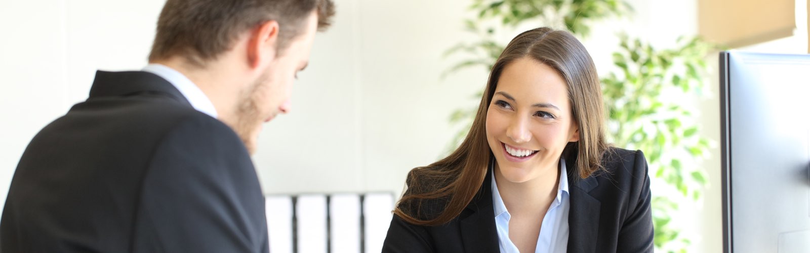 Human resource professional interviewing a job candidate