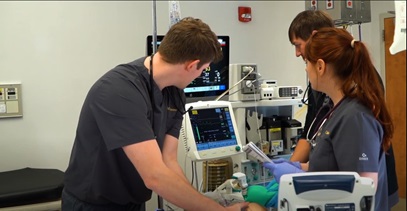 three anesthesia science students in the South University simulation lab