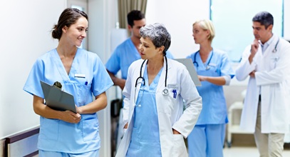 A team of medical professionals move to their next task