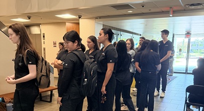 Tampa Nursing and PA students line up to help with an Immunization event