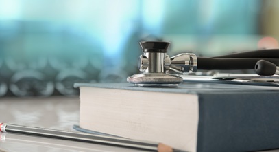 stethescope and textbook hinting at new careers