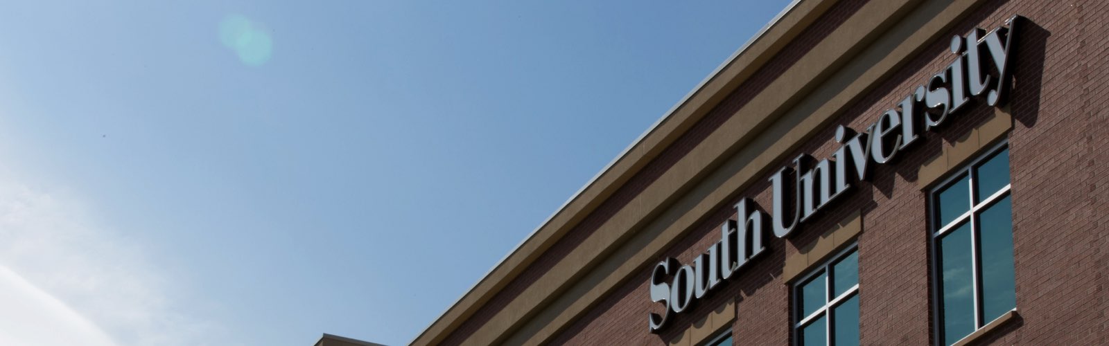 south university logo on building